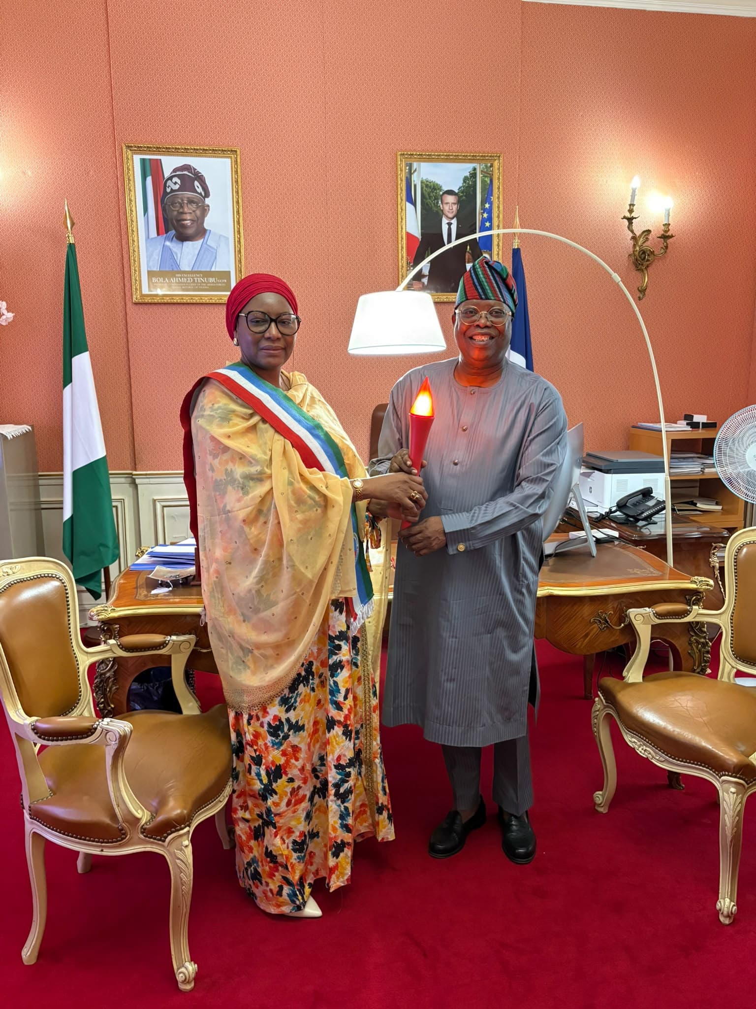 TTB France Delegation Presents Torch to Nigerian Ambassador